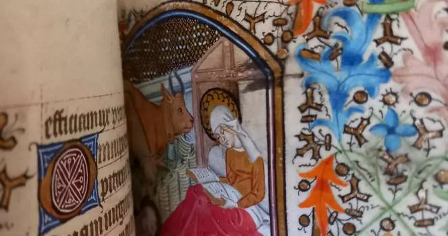 Ancient cryptic medieval manuscripts with mysterious symbols during guided research tour